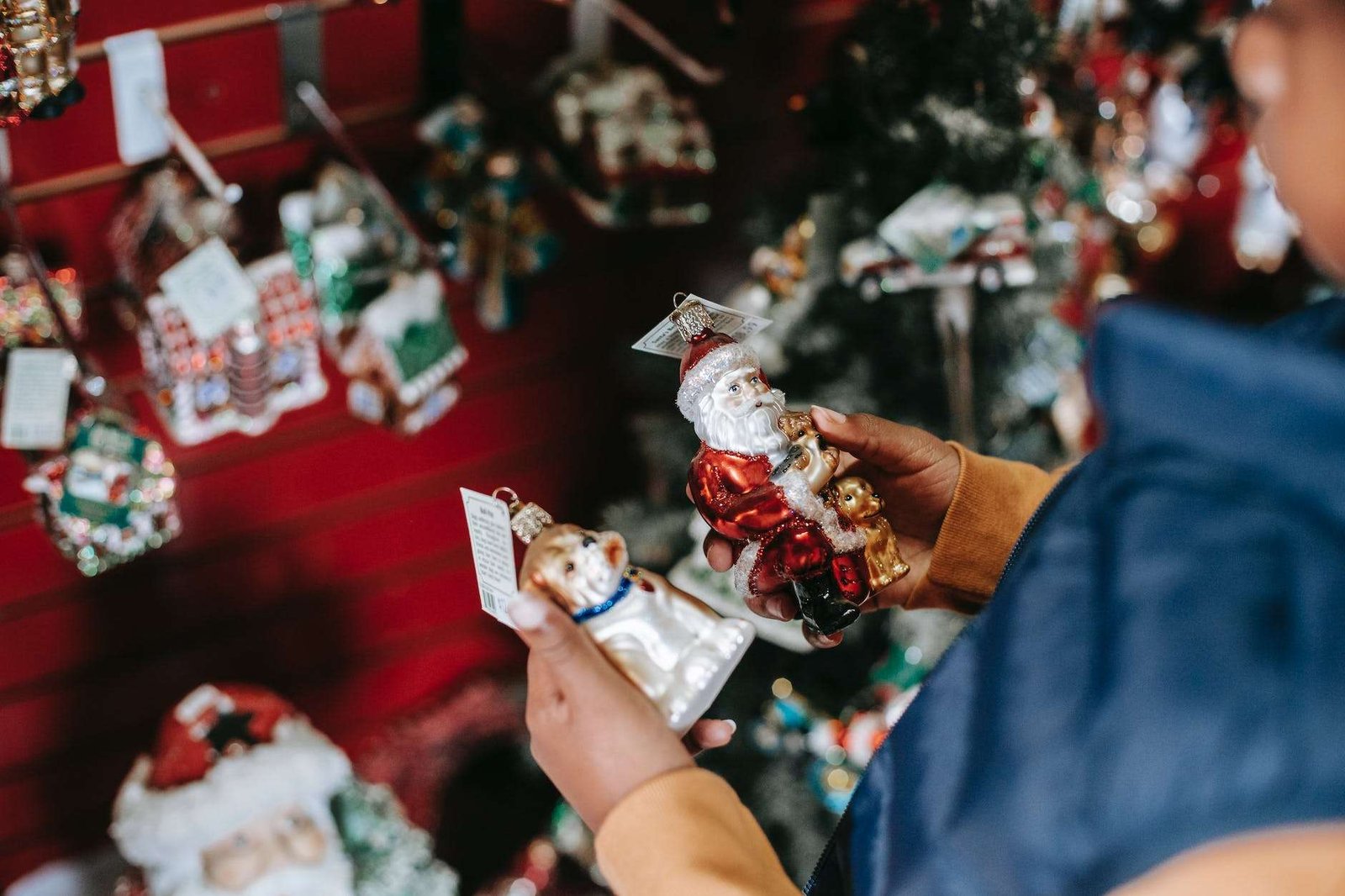 ethnic girl choosing toys for christmas tree
